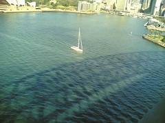 sailboat and harbour bridge shadow