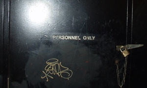 photograph of door marked 'personnel only'