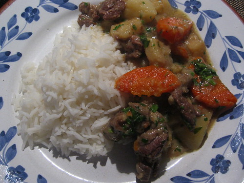 Goat stew with root vegetables and rice